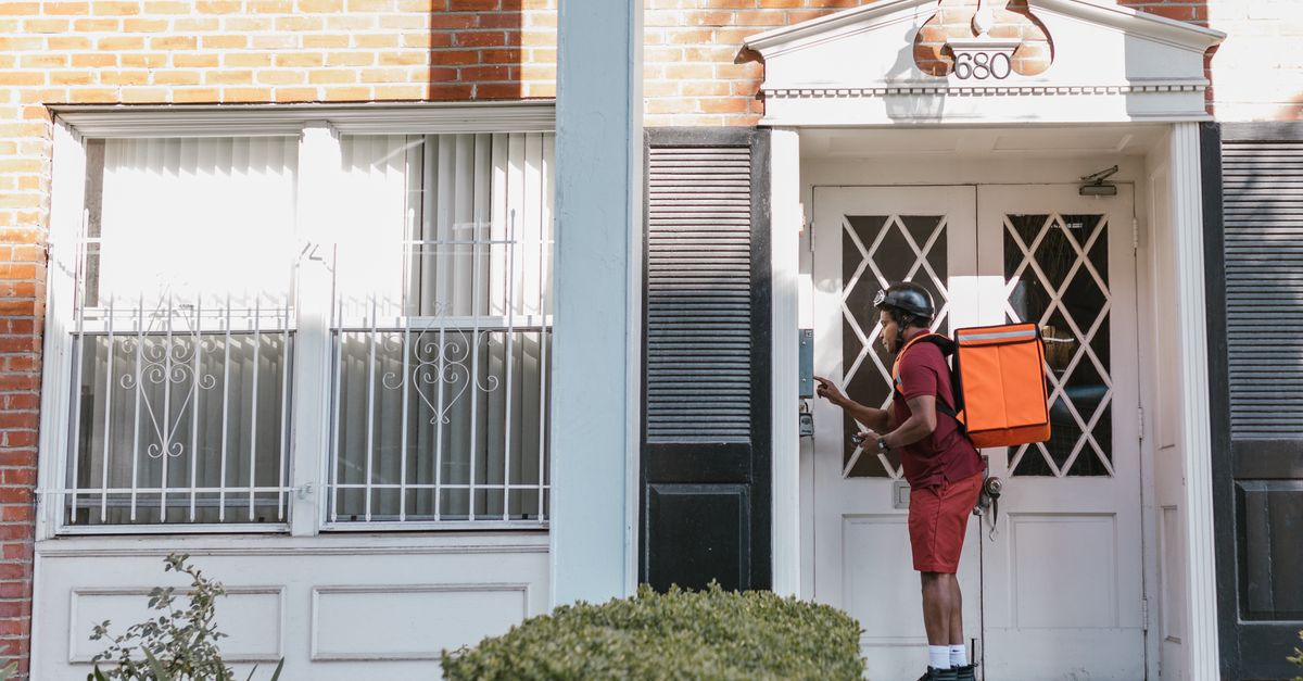 locksmith unlocking front door — Greg Locksmith